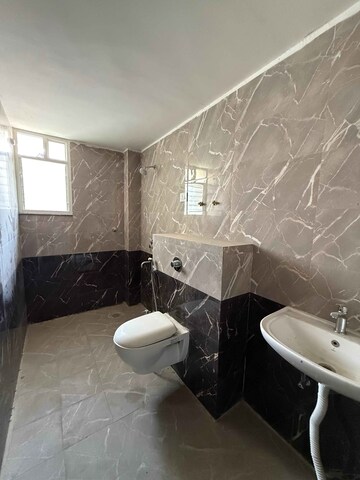 Bathroom in 3 BHK Apartment at Kidwaipuri – for Sale