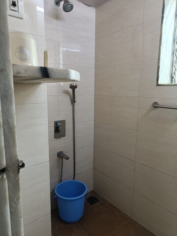 Bathroom in 1 BHK Apartment at Vile Parle West – for Rent