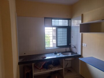 Kitchen in 1 BHK Apartment at Fiama Residency, Ghodbunder Road – for Sale