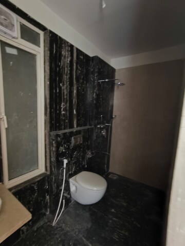 Bathroom in 4 BHK Apartment at Omkar Alta Monte, Malad East – for Rent