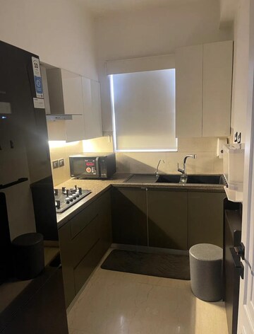 Kitchen in 3 BHK Apartment at Puri Anand Villas Phase II, Sector 81 – for Rent
