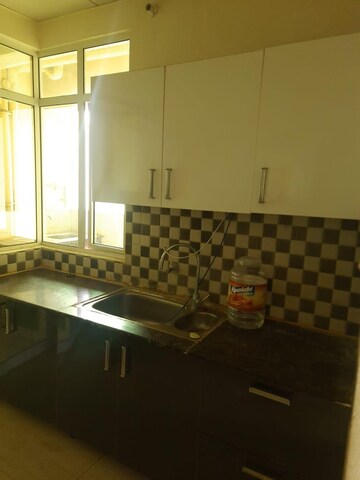 Kitchen in 4 BHK Apartment at Gaur Saundaryam, Tech Zone 4 Greater Noida – for Rent