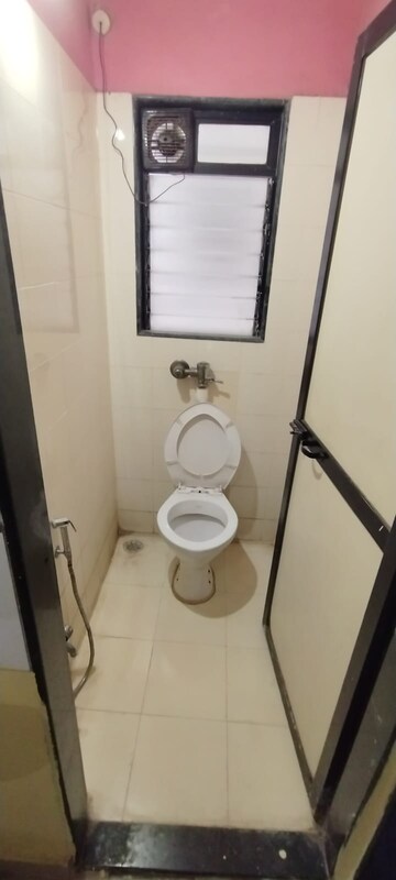 Bathroom in 2 BHK Apartment at Puranik City, Kasarvadavali – for Rent