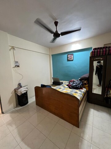 Master Bedroom in 1 BHK Apartment at Yashraj Park CHS, Kasarvadavali – for Sale