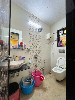 Bathroom in 2 BHK Apartment at New Brahmand Phase 7 CHS, Kiran Mill Colony – for Sale