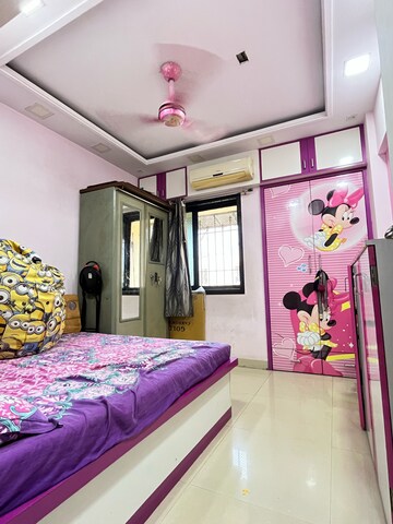 Bedroom in 2 BHK Apartment at New Brahmand Phase 7 CHS, Kiran Mill Colony – for Sale