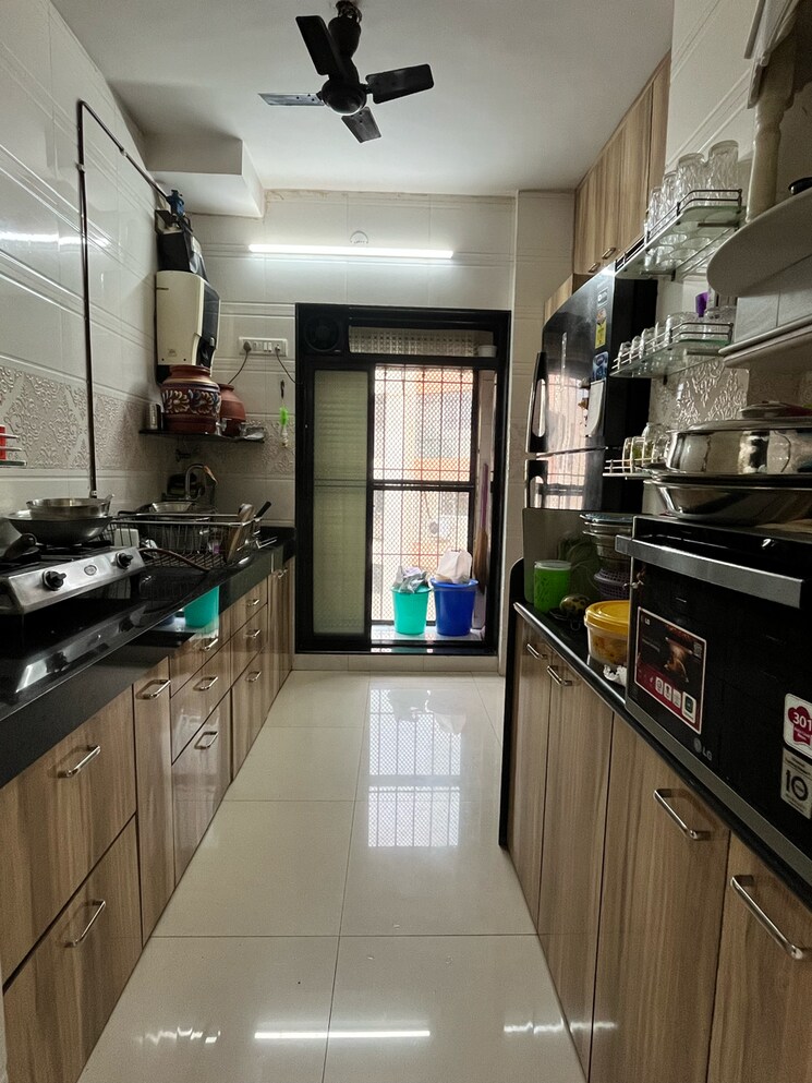 Kitchen, new-brahmand-phase-7-chs 2 Bedroom 650 Sq.Ft. Apartment In Kiran Mill Colony Thane 9005253