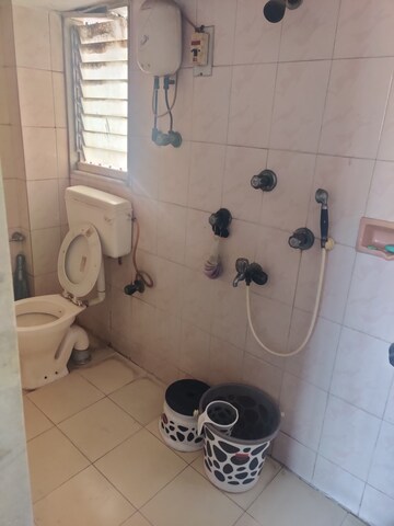 Bathroom in 1 BHK Apartment at Crystal Palace CHS, Malad West – for Rent