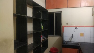 Kitchen in 1 BHK Apartment at Parijat Gardens Marigold CHS, Kasarvadavali – for Sale