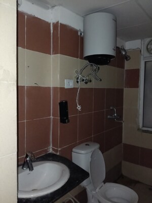 Bathroom in 2 BHK Apartment at Mahagun Mywoods, Sector 16c Greater Noida – for Sale