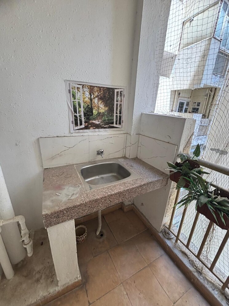 Kitchen, eldeco-live-by-the-greens 2 Bedroom 1140 Sq.Ft. Apartment In Sector 150 Noida 9005297