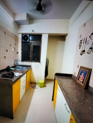 Kitchen in 2 BHK Apartment at Sanghvi Valley, Kalwa – for Sale