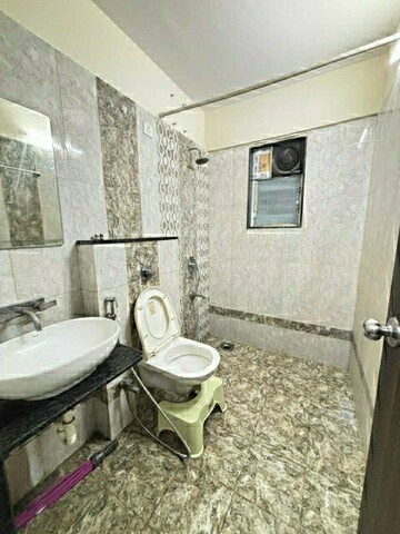Bathroom in 2 BHK Apartment at Mittal Atria, Dhanori – for Rent