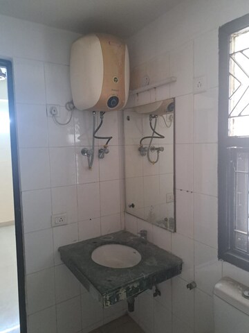 Bathroom in 2 BHK Apartment at Shiv Sai Ozone Park, Sector 86 – for Rent