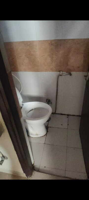 Bathroom in 2 BHK Apartment at Nitishree Aura Chimera, Raj Nagar Extension – for Sale