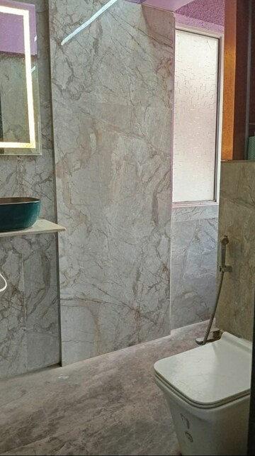 Bathroom in 3 BHK Apartment at Pride World City Wellington, Charholi Budruk – for Rent