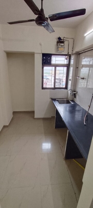Kitchen in 1 BHK Apartment at New Vegas Plaza, Owale – for Rent