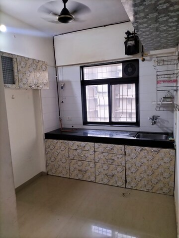 Kitchen in 1 BHK Apartment at Raunak Heights, Ghodbunder Road – for Rent
