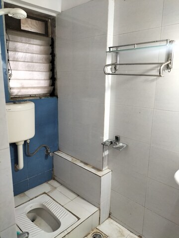 Bathroom in 1 BHK Apartment at Raunak Heights, Ghodbunder Road – for Rent
