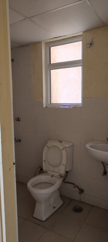 Bathroom in 2 BHK Apartment at Wave Dream Homes, Wave City – for Rent