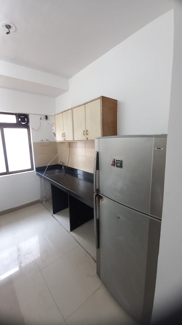 Kitchen in 2 BHK Apartment at Lodha Splendora, Ghodbunder Road – for Rent