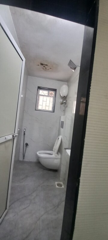 Bathroom in 1 BHK Apartment at Om Prabhu Manohar CHS, Seawoods Sector 50 – for Rent