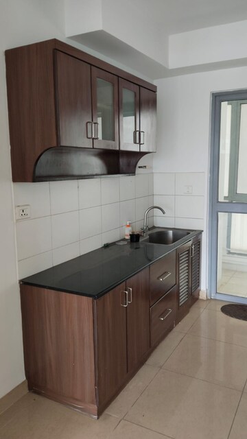 Kitchen in 3 BHK Apartment at Puravankara Elita Promenade, Jp Nagar – for Sale