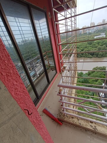 Balcony in 2 BHK Apartment at Om Prabhu Manohar CHS, Seawoods Sector 50 – for Rent