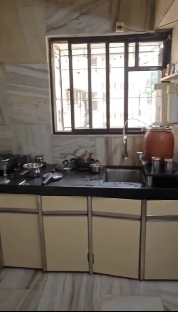 Kitchen in 2 BHK Apartment at Dhanlaxmi Apartment Dadar East, Dadar East – for Rent