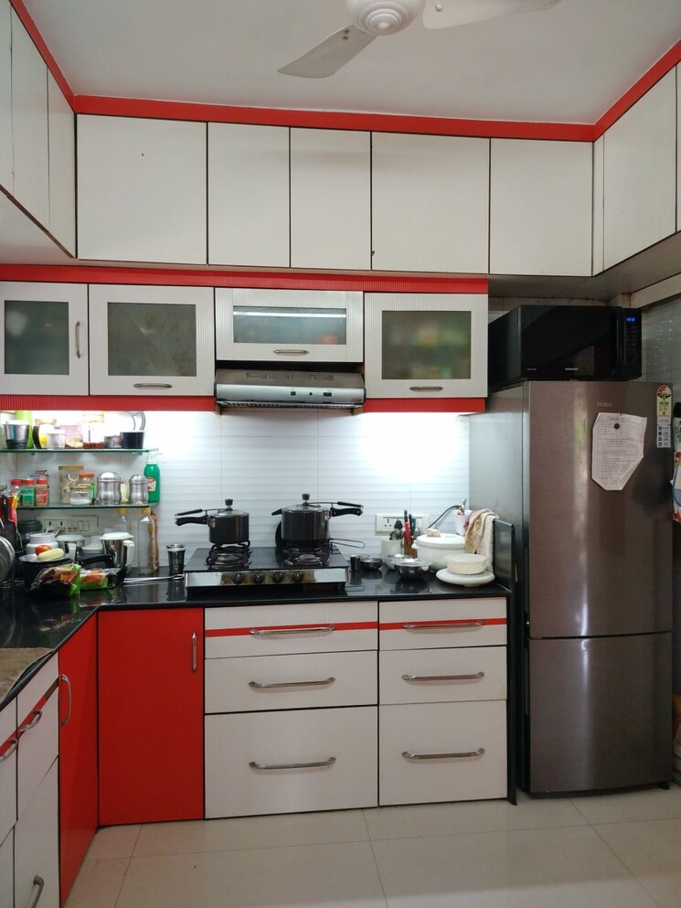 Kitchen, earth-galaxy-dadar 2 Bedroom 700 Sq.Ft. Apartment In Dadar East Mumbai 9005840