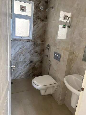 Bathroom in 3 BHK Apartment at Omaxe The Palace, Gomti Nagar – for Rent