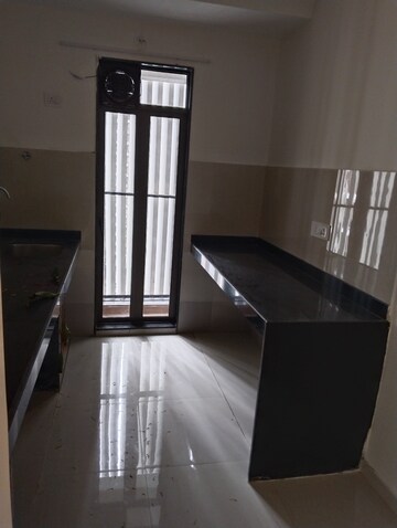 Kitchen in 2 BHK Apartment at Runwal My City Phase II Cluster 05, Dombivli East – for Rent