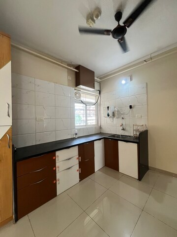Kitchen in 2 BHK Apartment at Godrej Green Cove, Mahalunge – for Rent