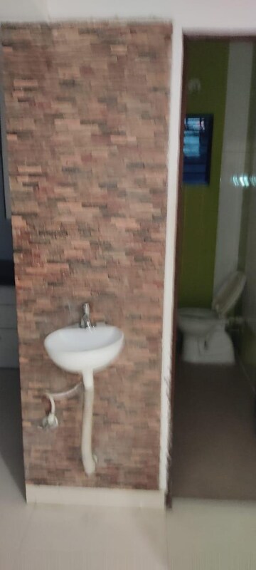 Bathroom in 3 BHK Apartment at Narendra Nagar – for Rent
