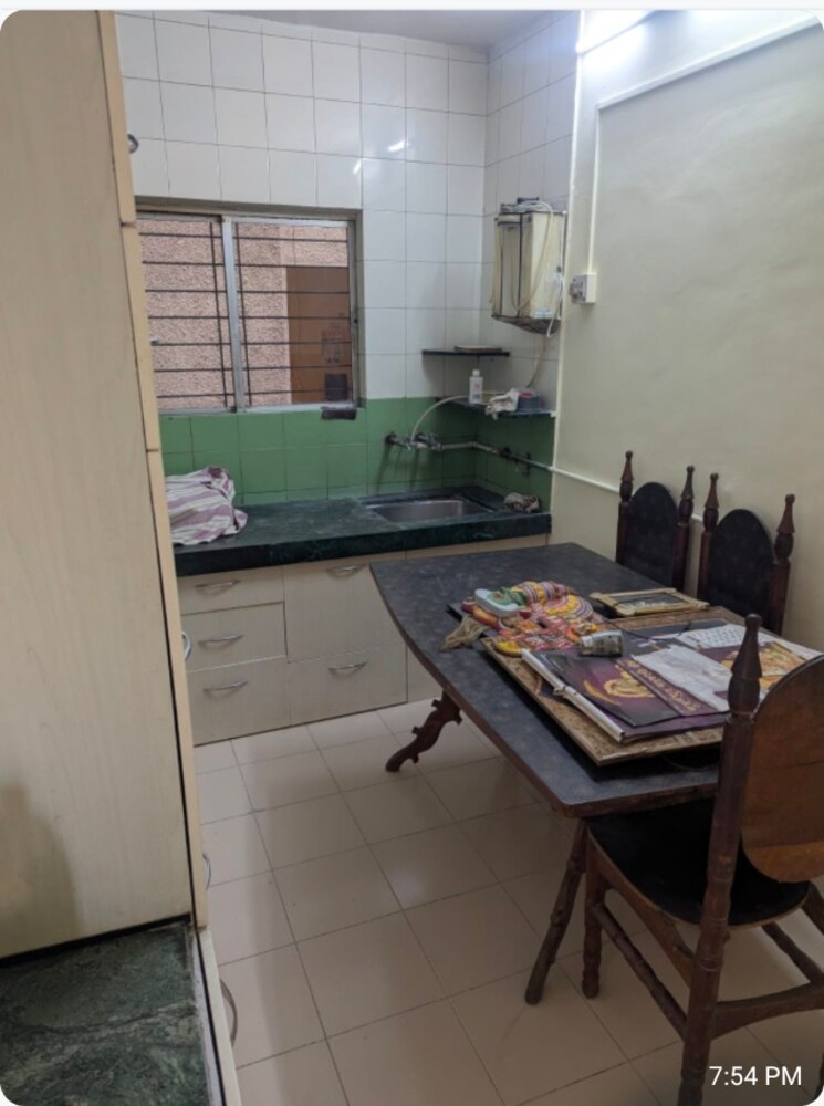 Kitchen, karan-ashiyana 2 Bedroom 813 Sq.Ft. Apartment In Wadgaon Sheri Pune 9006086