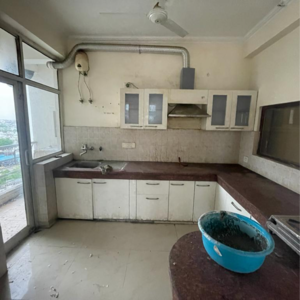 Kitchen in 4 BHK Penthouse at Parsvnath Planet, Vibhuti Khand – for Sale