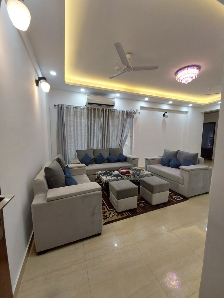 Living Room, purvanchal-royal-city 3 Bedroom 1735 Sq.Ft. Apartment In Chi V Greater Noida Greater Noida 9006146