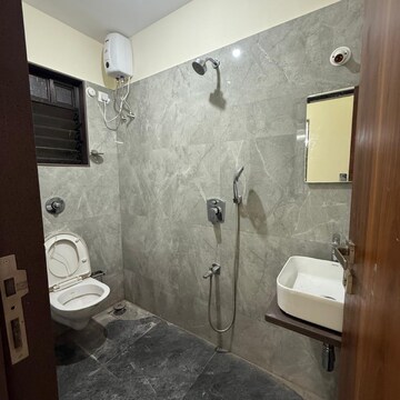 Bathroom in 2 BHK Apartment at Accord CHS Andheri West, Lokhandwala Complex – for Rent