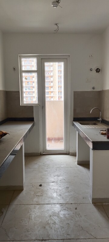 Kitchen in 3 BHK Apartment at Rishita Manhattan, Gomti Nagar – for Sale