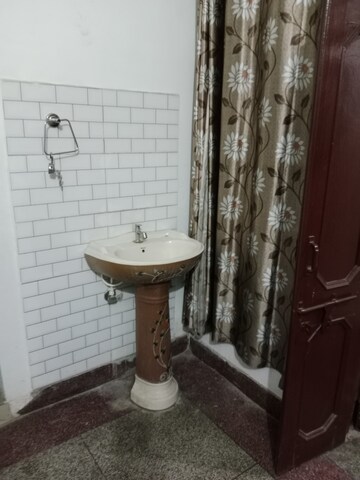 Bathroom in 1 BHK Builder Floor at Huda – for Rent