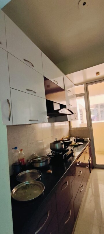 Kitchen in 3 BHK Apartment at Mahagun Mirabella, Sector 79 – for Rent