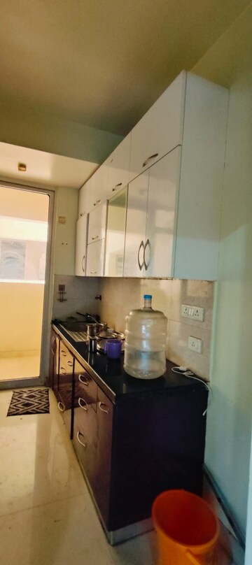 Kitchen in 3 BHK Apartment at Mahagun Mirabella, Sector 79 – for Rent