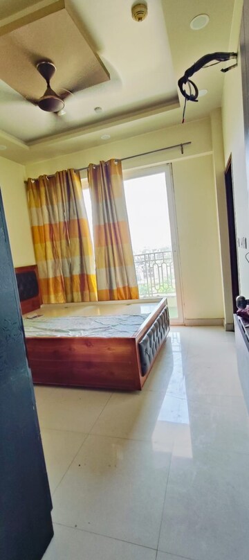 Bedroom in 3 BHK Apartment at Mahagun Mirabella, Sector 79 – for Rent