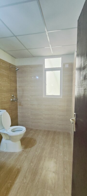 Bathroom in 3 BHK Apartment at Aims Golf Avenue II, Sector 75 – for Rent