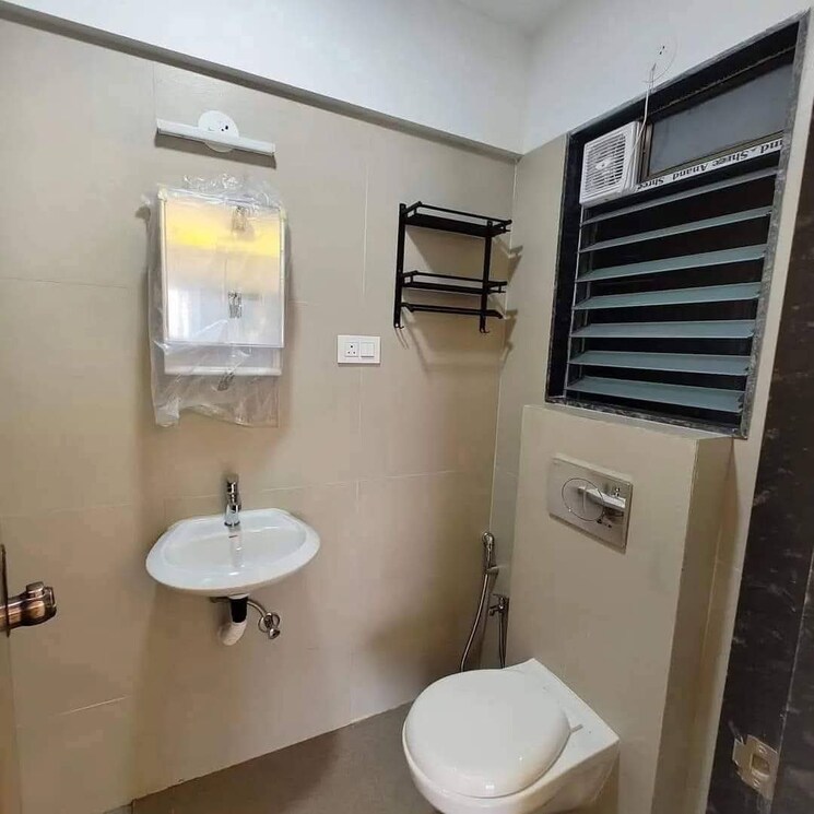Bathroom, je-and-vee-om-trimurti 1 Bedroom 645 Sq.Ft. Apartment In Malad East Mumbai 9006391