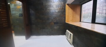 Living Room in 1 BHK Apartment at Queens View, Juhu – for Sale