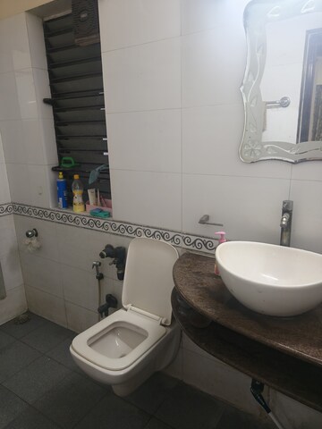 Bathroom in 3 BHK Apartment at K Raheja Palm Court, Malad West – for Rent