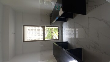 Kitchen in 1 BHK Apartment at Raymond The Address, Pokhran Road No Two – for Rent