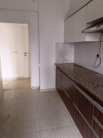 Kitchen in 3 BHK Apartment at DLF Regal Gardens, Sector 90 – for Rent