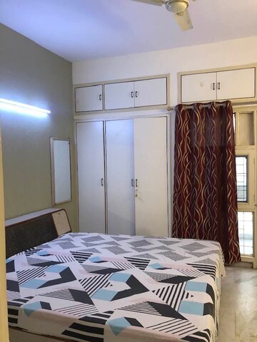 Bedroom in 2 BHK Apartment at Vasant Apartments, Sector 13 – for Rent